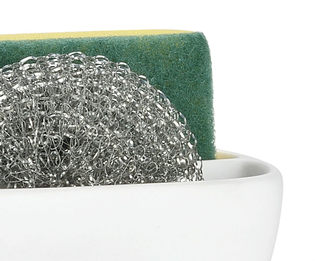 White holder with sponge and scourer